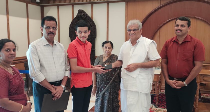 President Dr. D Veerendra Hegde and Hemavathi V Hegde felicitates Chinmay G K the Second Topper of the state